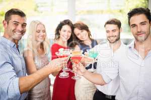 Group of friends having cocktail