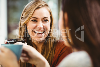 Friends chatting over coffee