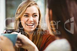 Friends chatting over coffee