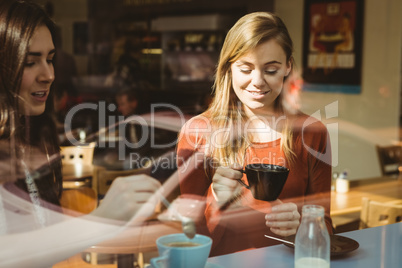 Friends chatting over coffee