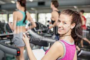 Female trainer smiling to camera