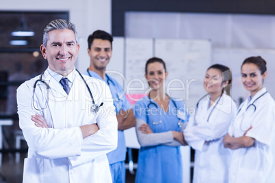 Portrait of medical team standing with arms crossed