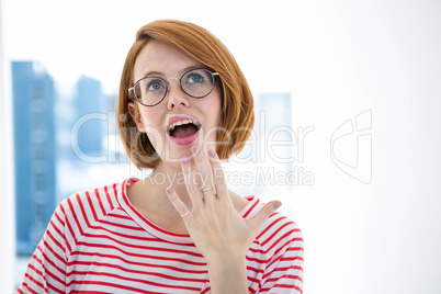 Cute red haired hipster with glasses