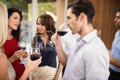 Group of friends having wine