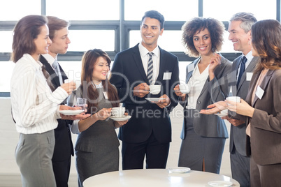 Businesspeople having a discussion during breaktime