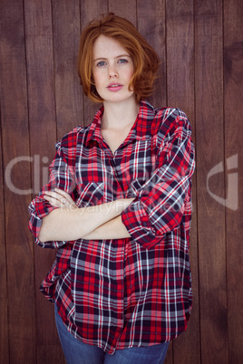 beautiful hipster woman with her arms crossed