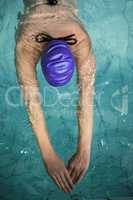 Sporty woman swimming