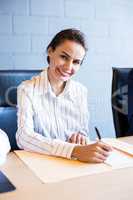 Confident businesswoman in business meeting