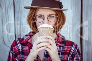 beautiful hipster woman drinking coffee