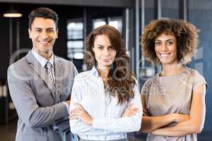 Portrait of smiling businessman and businesswoman