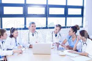 Medical team discussing in meeting