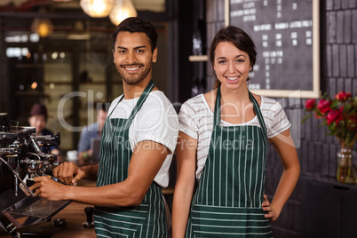 Smiling baristas working