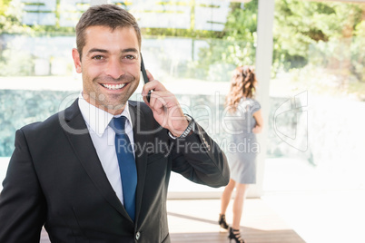 Real-estate agent talking on the mobile phone