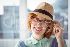 Cute red haired hipster with glasses