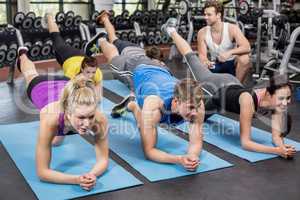 Group of people working their abs