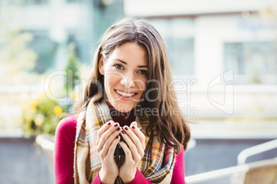 Woman drinking a cup of coffee