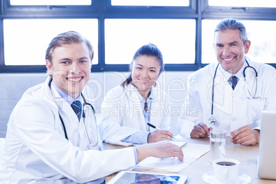 Medical team smiling at conference room