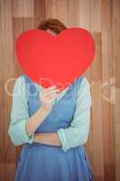 Pretty hipster holding heart