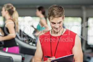 Male trainer smiling to camera