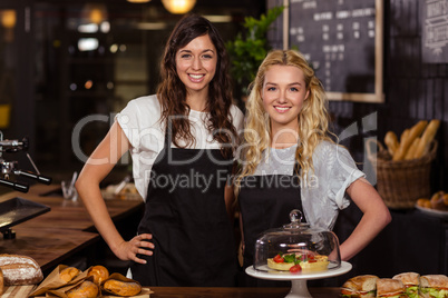 Pretty waitresses behind the counter