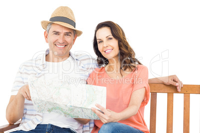 Couple on bench looking at map