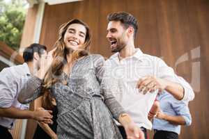 Group of young friends dancing