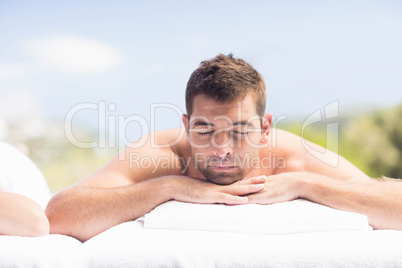 Man relaxing on massage table