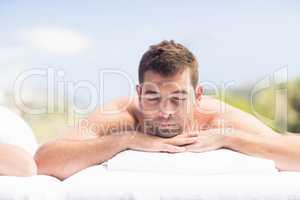 Man relaxing on massage table