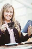 Businesswoman using her tablet pc