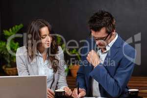 Business people working with laptop and coffee