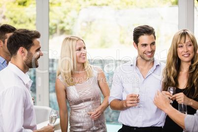 Group of friends having champagne