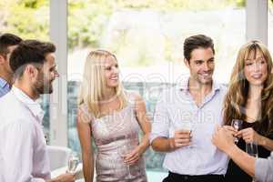 Group of friends having champagne