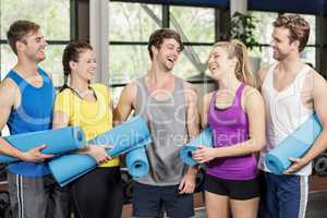 Group of people with fitness mat