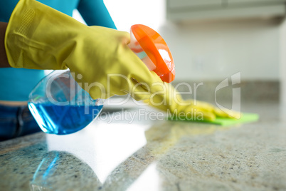 Pretty woman doing her house chores