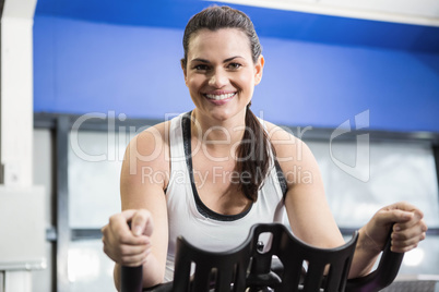 Woman using exercise bike