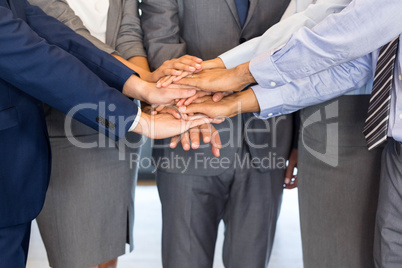 Close-up of Businesspeople stacking hands