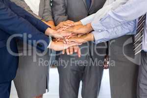Close-up of Businesspeople stacking hands