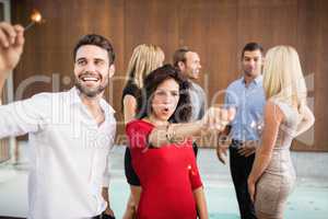 Group of young friends dancing