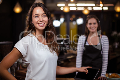 Smiling woman in the bar
