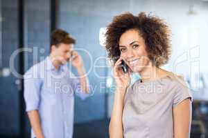 Young woman communicating on mobile phone