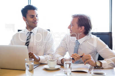 Businesspeople having a discussion in conference room