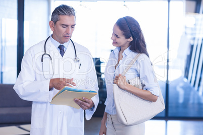 Doctor looking at medical report