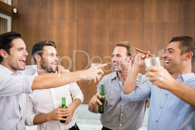 Group of young men having drinks