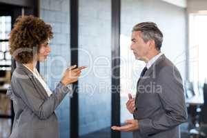 Businesspeople having a discussion in office