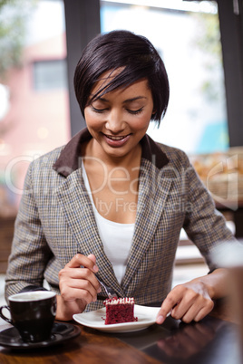 Woman eating a cake