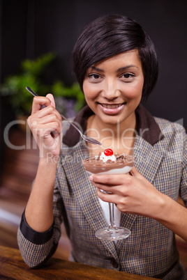 Pretty woman about to eat dessert