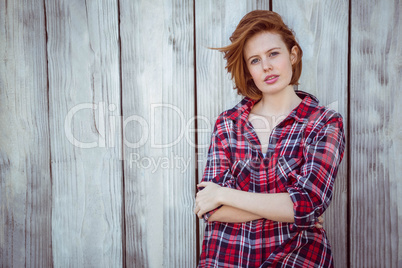 beautiful hipster woman with her arms crossed