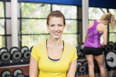 Portrait of athletic smiling woman