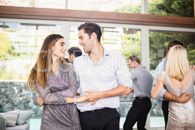 Group of young friends dancing