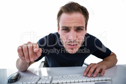 Handsome man using computer